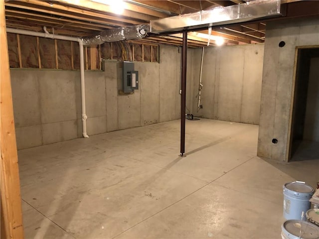 unfinished below grade area with electric panel