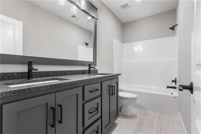 17147 S Heatherwood St, Olathe, KS 66062 - full bathroom with double vanity, toilet, and shower / bathtub combination