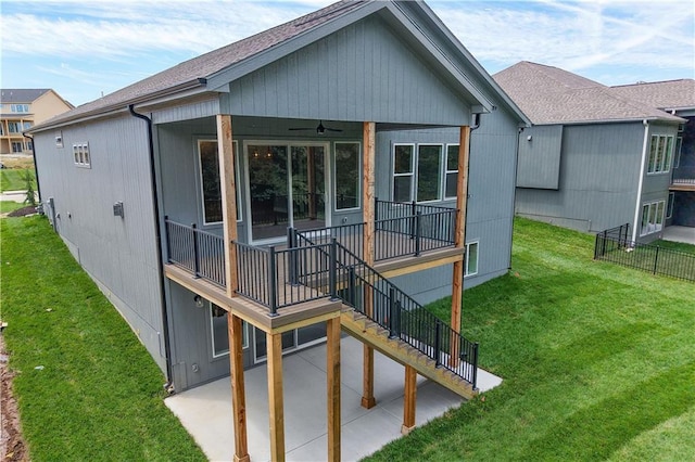 17147 S Heatherwood St, Olathe, KS 66062 - rear view of property featuring a patio, stairway, a lawn, and ceiling fan