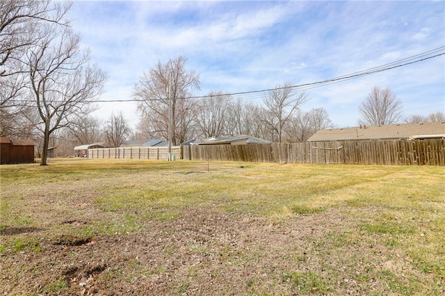 view of yard featuring fence