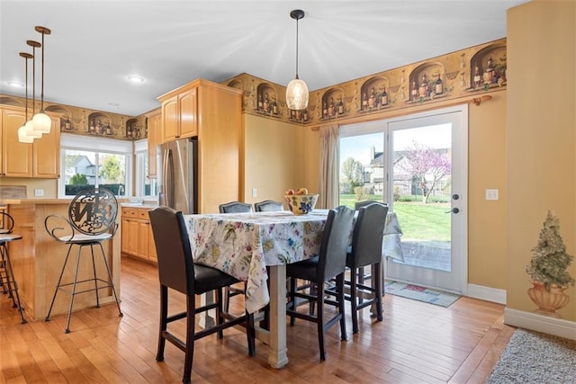 15498 Cedar Ln, Basehor, KS 66007 - dining space with light wood-style floors and recessed lighting