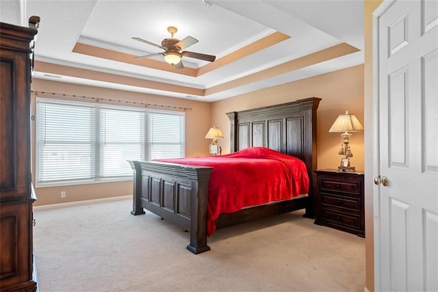 15498 Cedar Ln, Basehor, KS 66007 - bedroom with light carpet, a tray ceiling, crown molding, and ceiling fan