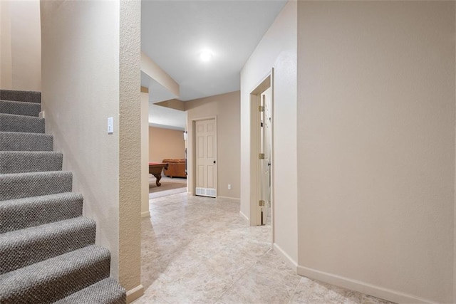 15498 Cedar Ln, Basehor, KS 66007 - hallway with stairs and baseboards