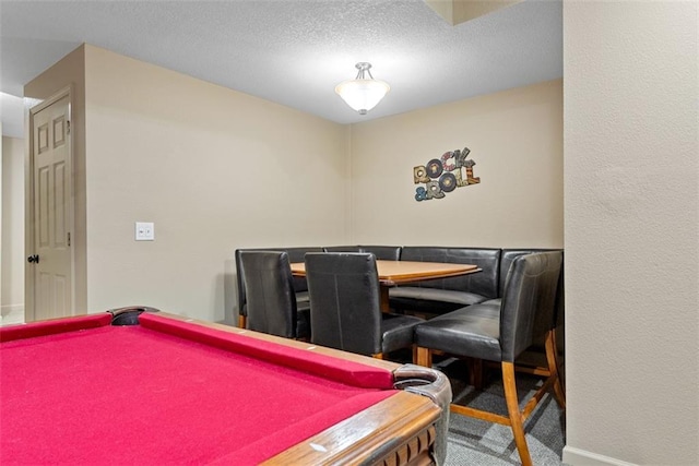 15498 Cedar Ln, Basehor, KS 66007 - recreation room with pool table, carpet, and a textured ceiling