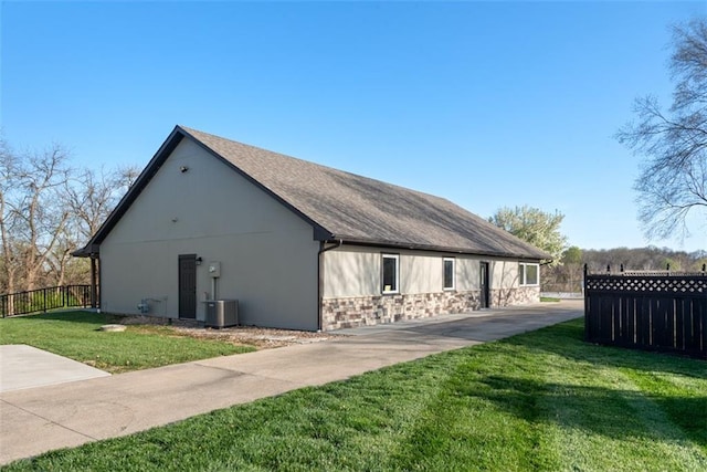 15498 Cedar Ln, Basehor, KS 66007 - view of property exterior with stone siding