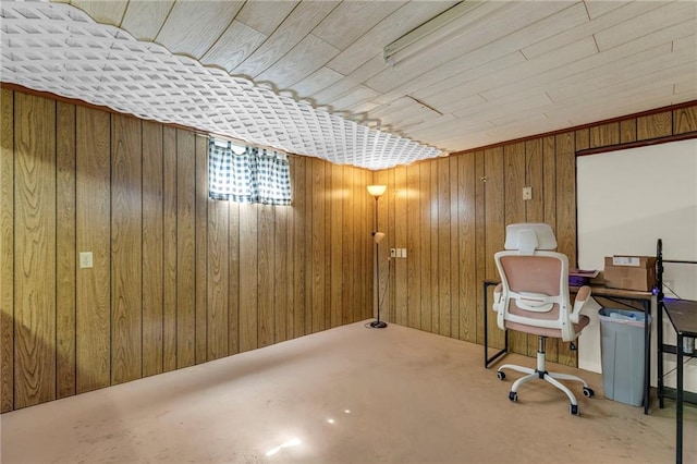 office space featuring wooden walls