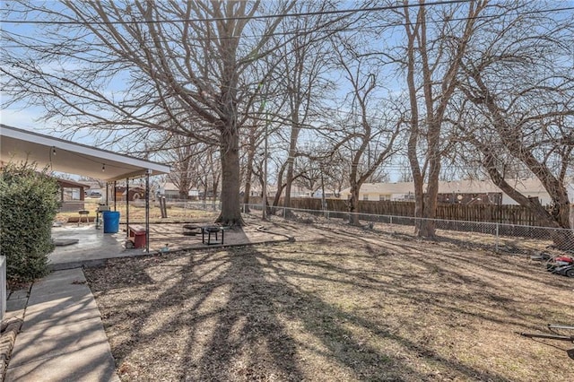 view of yard with a fenced backyard and a patio