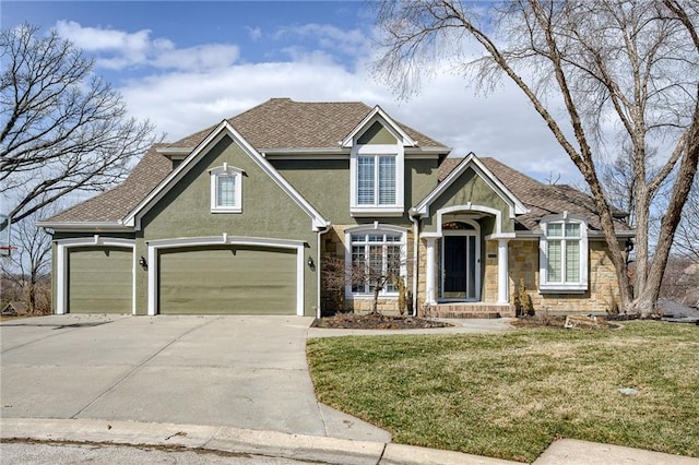 view of front of home with stone siding, stucco siding, driveway, and a front yard