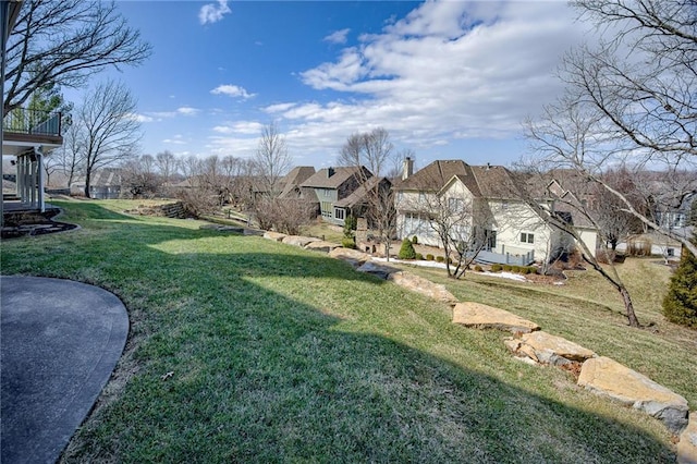 view of yard featuring a residential view