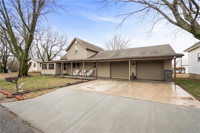 view of front facade featuring a garage, covered porch, a front lawn, and concrete driveway