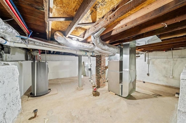 unfinished below grade area with gas water heater and heating unit