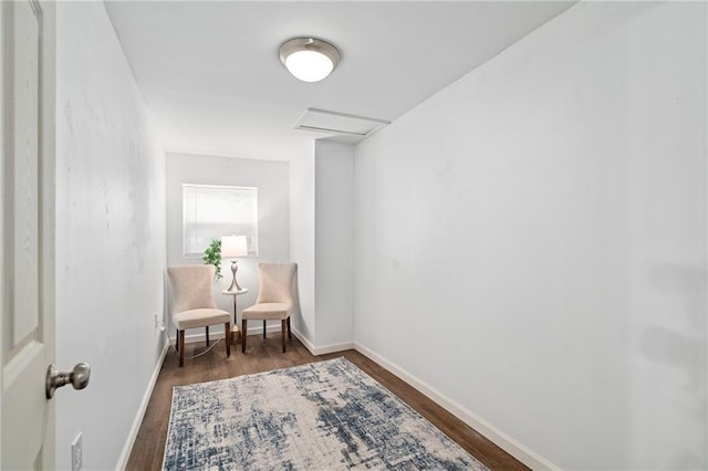 1310 Lawrence Ave, Kansas City, KS 66103 - sitting room with dark wood finished floors, attic access, and baseboards