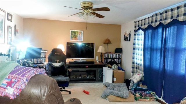 carpeted bedroom featuring a ceiling fan