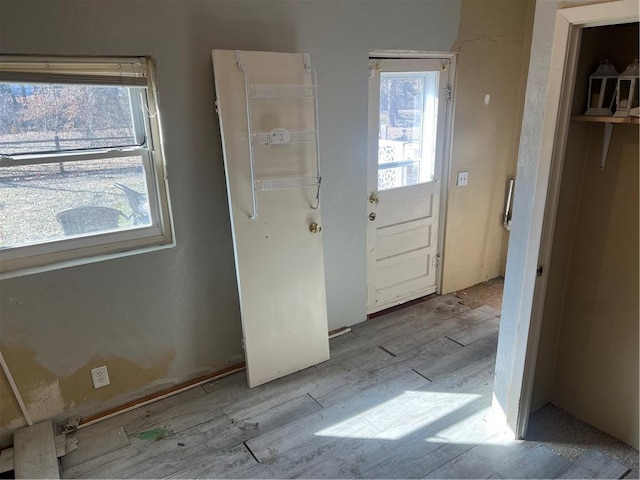 doorway to outside featuring wood finished floors