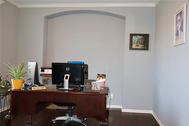 office area with crown molding, wood finished floors, and baseboards