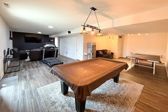 game room featuring billiards, wood finished floors, visible vents, and baseboards