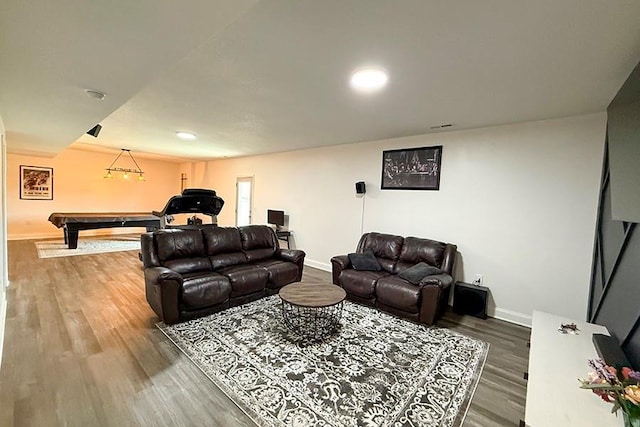 living area with billiards, wood finished floors, visible vents, and baseboards