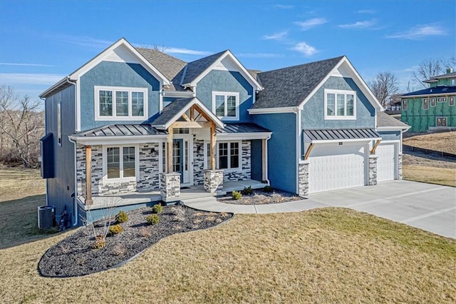 view of front of home featuring covered porch, metal roof, and a standing seam roof