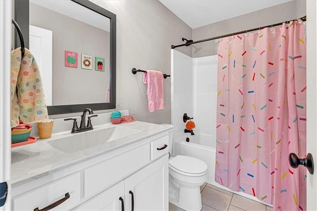 full bath featuring tile patterned floors, shower / bath combo with shower curtain, toilet, and vanity