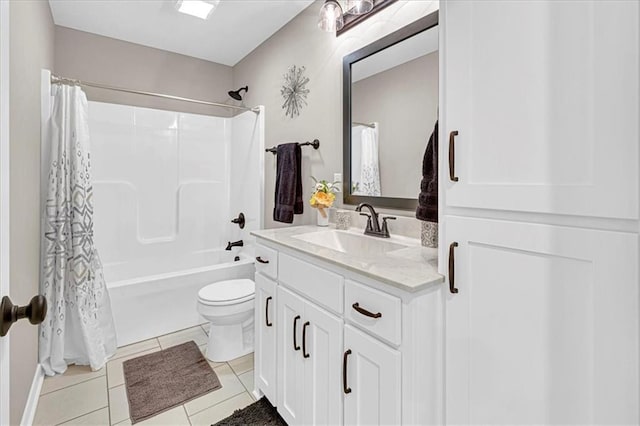 full bathroom featuring tile patterned floors, toilet, vanity, and shower / tub combo