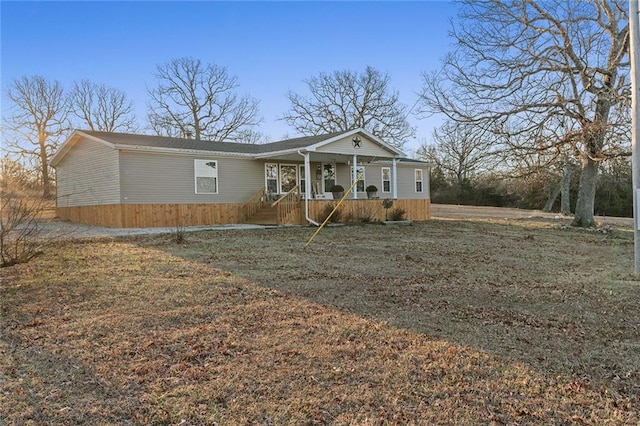 view of front of home featuring covered porch