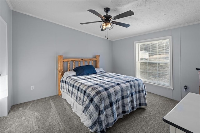 bedroom with a textured ceiling, crown molding, ceiling fan, and carpet floors