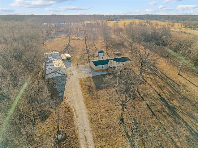 bird's eye view with a rural view and a view of trees