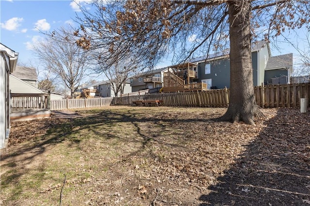 view of yard with a residential view and fence