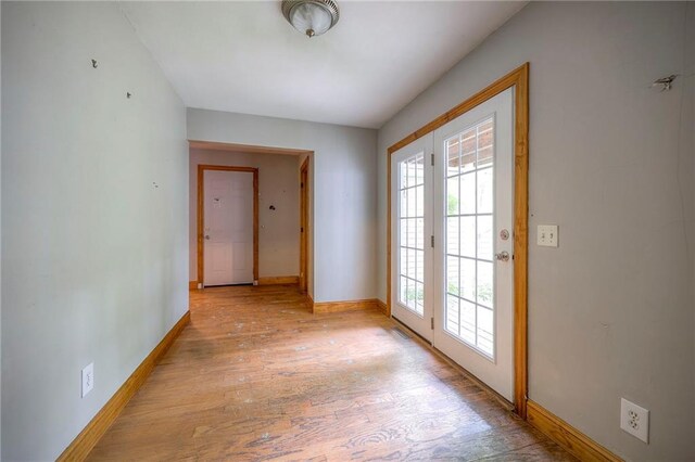 5200 NW Valley View Rd, Blue Springs, MO 64015 - entryway with wood finished floors and baseboards