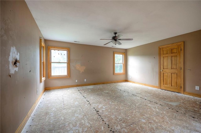 5200 NW Valley View Rd, Blue Springs, MO 64015 - spare room featuring a ceiling fan and baseboards