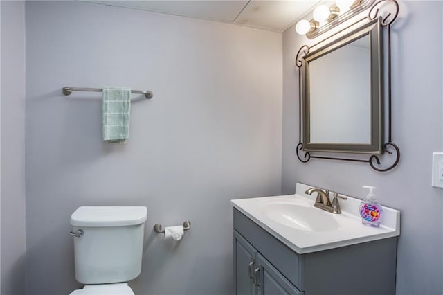 half bath with toilet and vanity