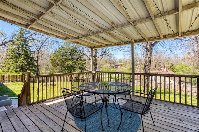 wooden deck with outdoor dining space