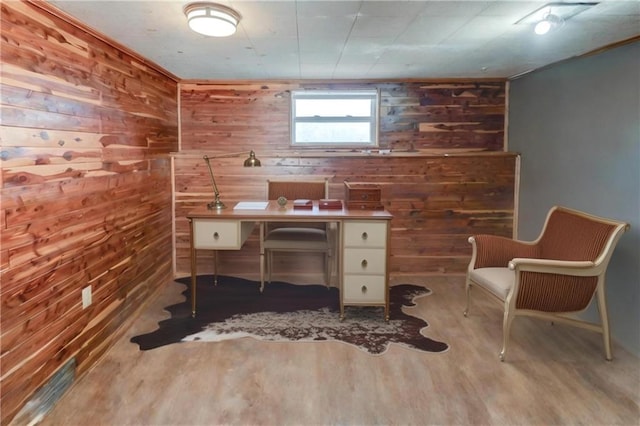 office area with wood walls and wood finished floors