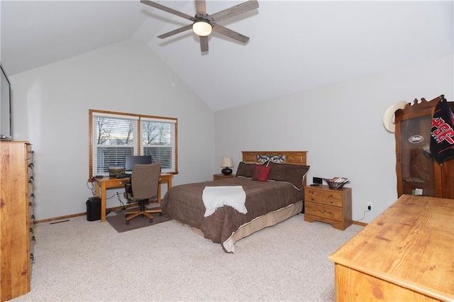 carpeted bedroom with baseboards, high vaulted ceiling, and a ceiling fan