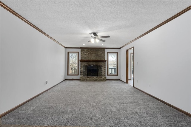 unfurnished living room featuring baseboards, carpet floors, a textured ceiling, and ceiling fan