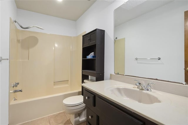 full bathroom featuring vanity, tile patterned floors, toilet, and washtub / shower combination