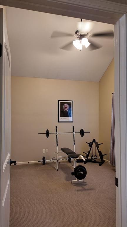 workout area with carpet and ceiling fan