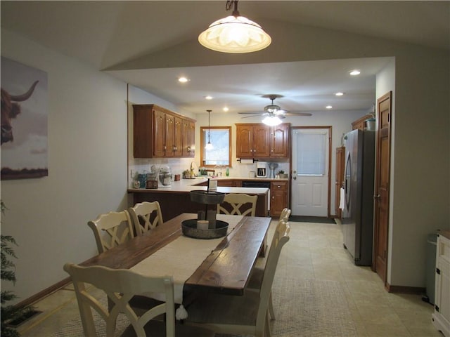 dining area featuring recessed lighting, ceiling fan, baseboards, and lofted ceiling