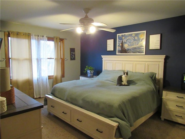 bedroom with carpet and a ceiling fan