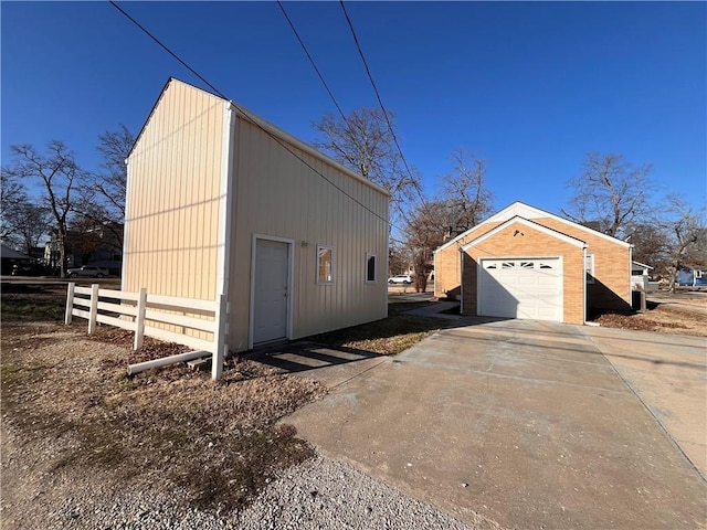 exterior space with fence and driveway