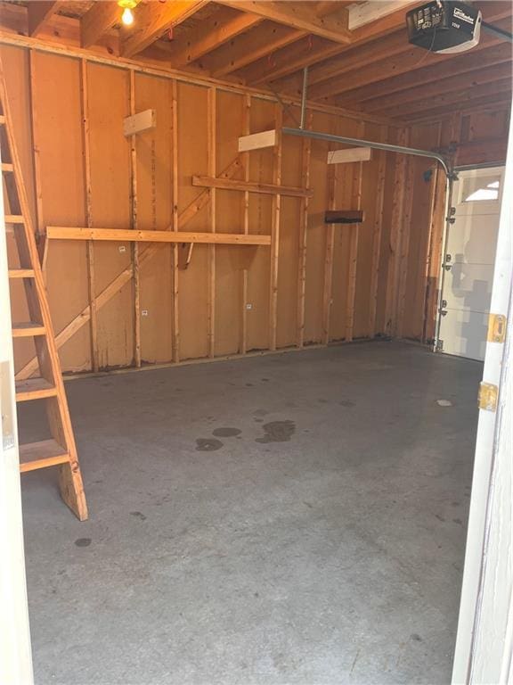 garage featuring a garage door opener