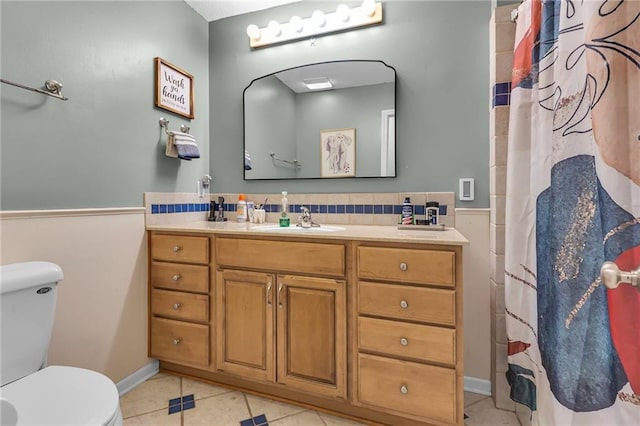 full bath with vanity, tile patterned floors, curtained shower, and toilet