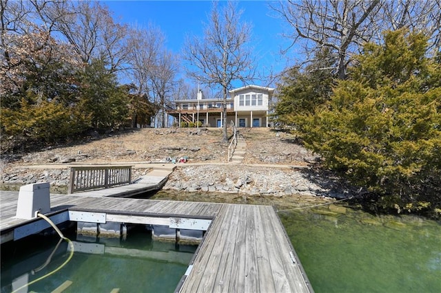 dock area featuring a water view