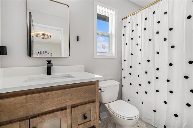 full bathroom with vanity, toilet, and a shower with curtain