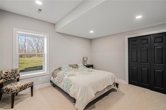 bedroom featuring carpet flooring, baseboards, and recessed lighting