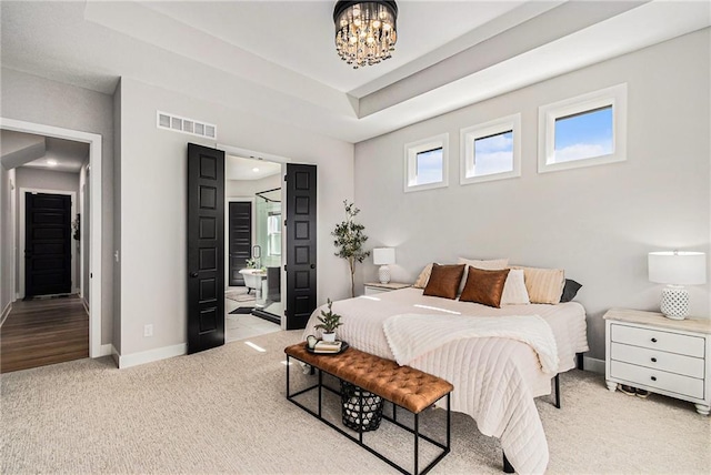 21143 W 189th Ct, Spring Hill, KS 66083 - bedroom with light carpet and a chandelier