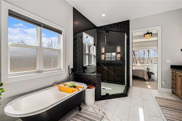 21143 W 189th Ct, Spring Hill, KS 66083 - full bath featuring marble finish flooring, a freestanding bath, a stall shower, recessed lighting, and vanity