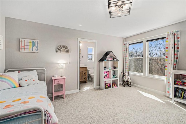 21143 W 189th Ct, Spring Hill, KS 66083 - carpeted bedroom with baseboards and connected bathroom