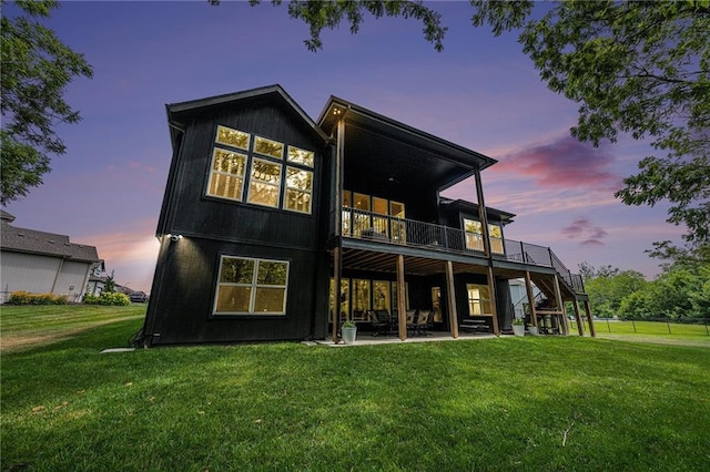21143 W 189th Ct, Spring Hill, KS 66083 - rear view of house with a patio, stairs, a lawn, and a wooden deck
