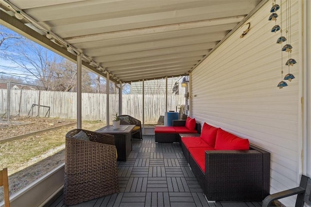 view of patio featuring outdoor lounge area and a fenced backyard